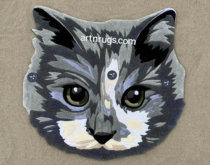 Gray cat portrait rug displayed on a gray carpet.