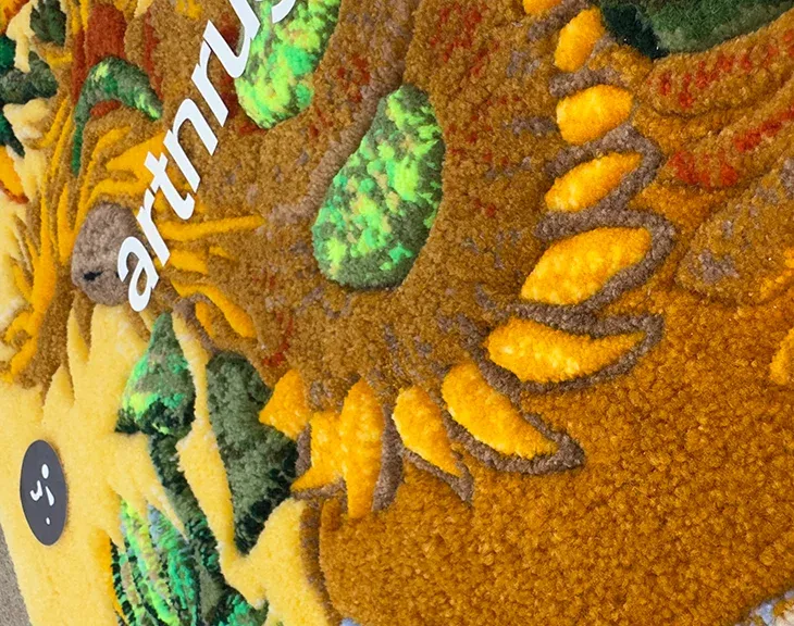 Close-up of the dense pile and yellow sunflower pattern.