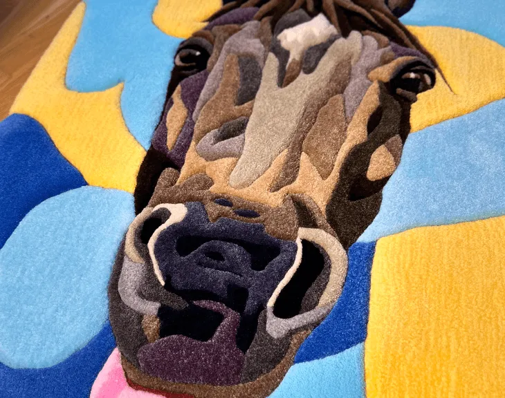 Close-up of the tufted horse face and muzzle.