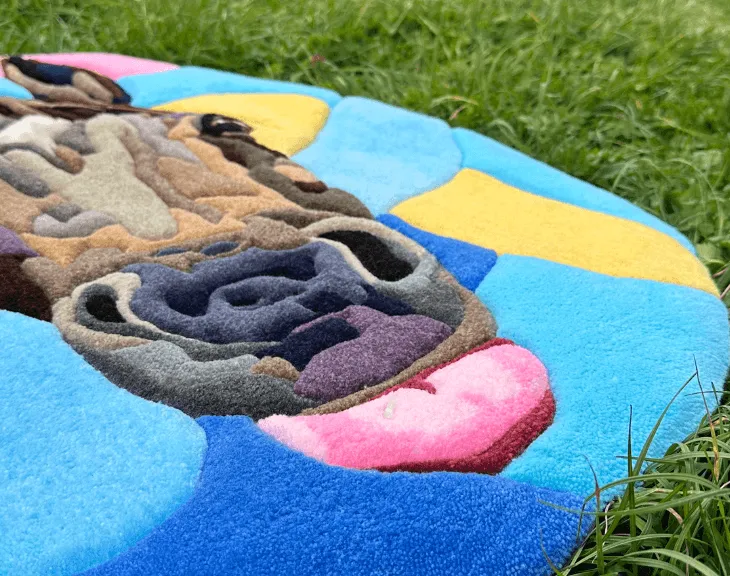 Side view of the horse portrait rug showing the sheared acrylic pile.